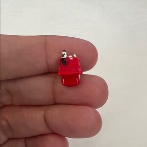 Snoopy Laying On Red Doghouse Charm